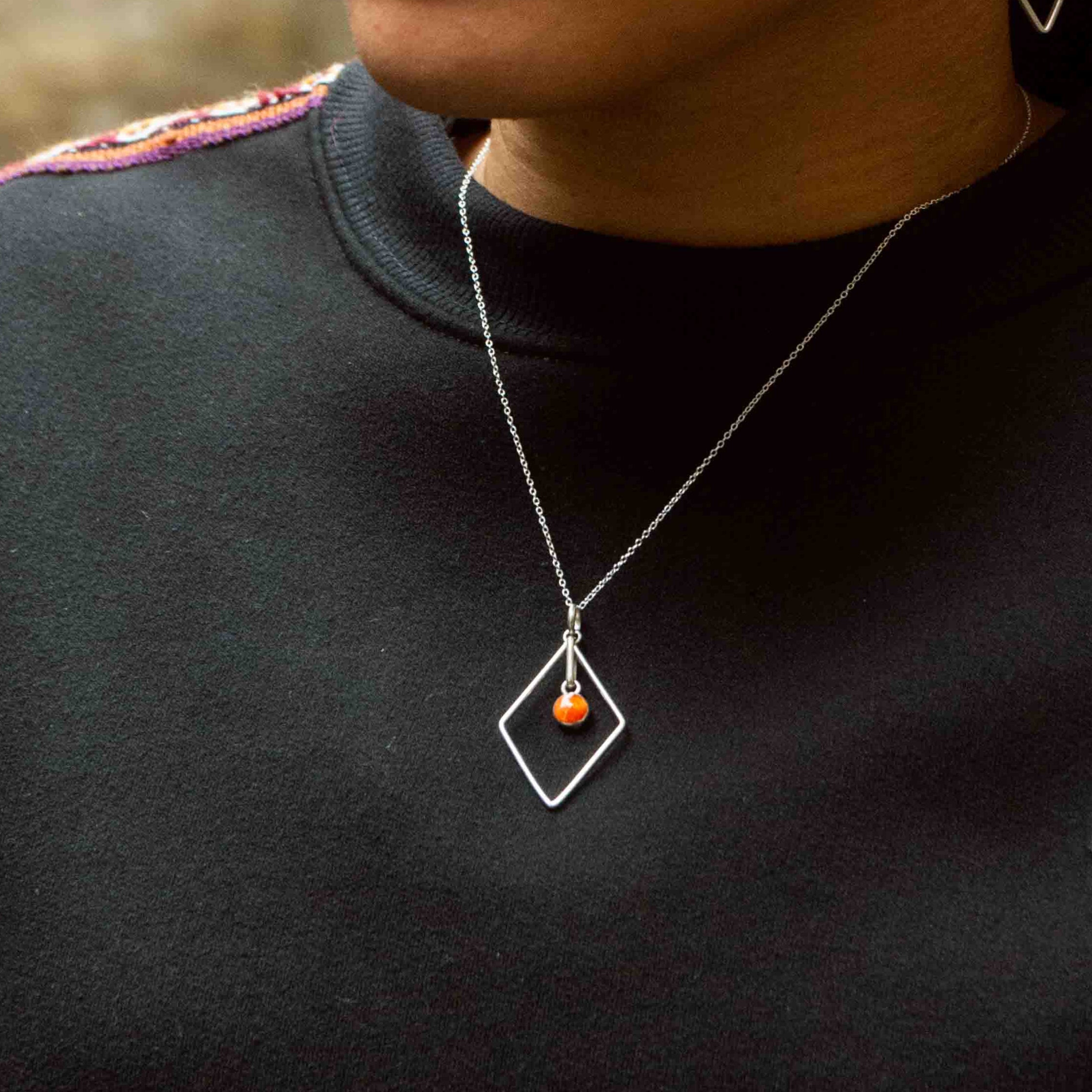 Orange spondylus and silver 950 rhombus necklace