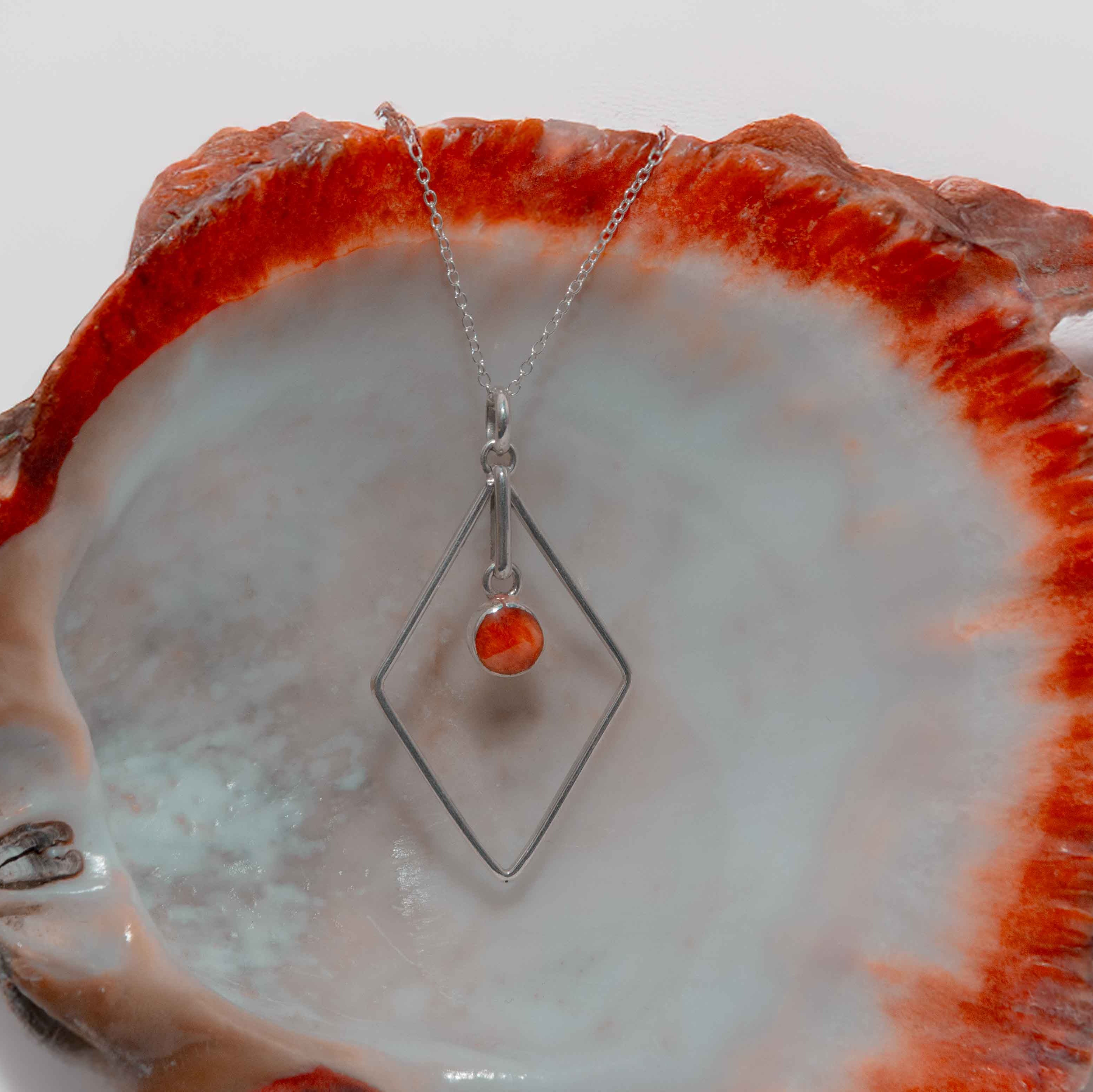 Orange spondylus and silver 950 rhombus necklace